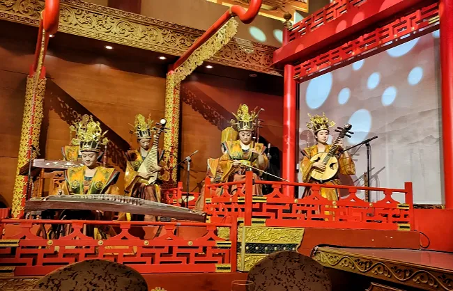 live traditional orchestra | China Xian Tour: Private & Tailor-Made China Tours Performers in traditional Tang attire playing classical Chinese instruments in Tang Dynasty Show in Xian