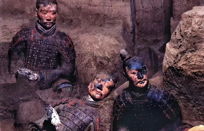 originally unearthed terracotta warriors with surviving lacquer-and-mineral paint | China Xian Tour: Private & Tailor-Made China Tours Originally unearthed terracotta warriors with surviving lacquer-and-mineral paint at Xi'an Terracotta Army Museum
