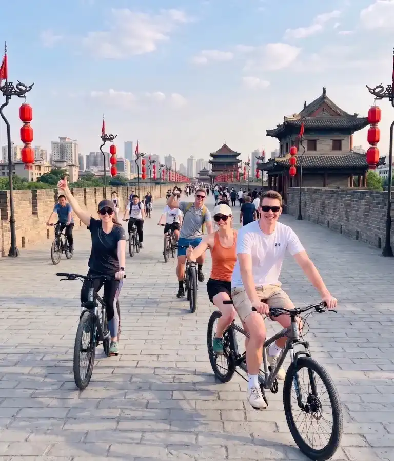 Happy cycling on Xi'an city wall | China Xian Tour: Private & Tailor-Made China Tours Happy cycling on Xi'an city wall