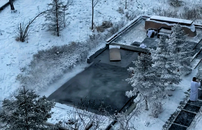 Soak in a hot spring surrounded by snow in Changbai Mountain