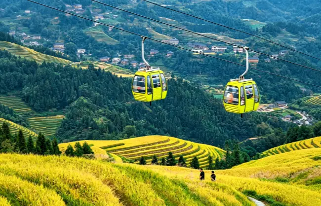 cable-car-view-of-jinkeng-dazhai-red-yao-rice-terraces | China Xian Tour: Private & Tailor-Made China Tours Cable car view of Jinkeng Dazhai Red Yao Rice Terraces