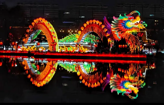 lantern show in tang paradise | China Xian Tour: Private & Tailor-Made China Tours The dragon-shaped lantern displayed in Tang Paradise in Xian during Spring Festival