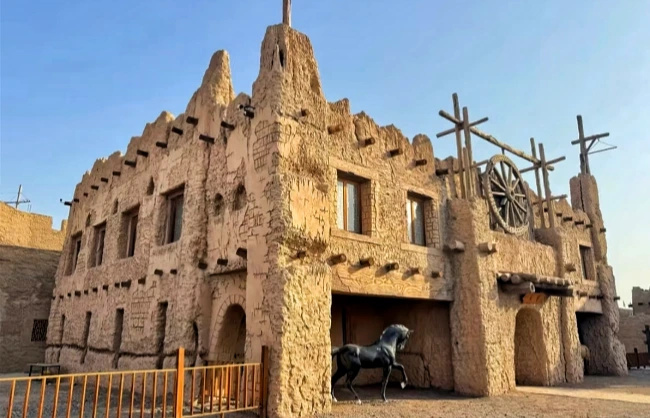 characteristic earthen buildings in karez source scenic area | China Xian Tour: Private & Tailor-Made China Tours Earthen buildings in Karez Source Scenic Area, Turpan, Xinjiang