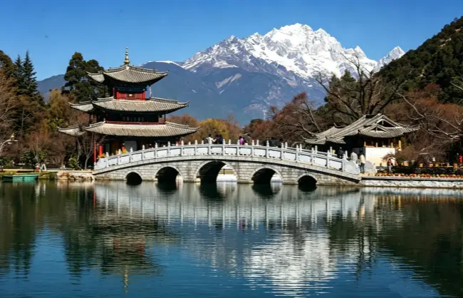 black-dragon-pool | China Xian Tour: Private & Tailor-Made China Tours Black Dragon Pool snow mountains and bridge