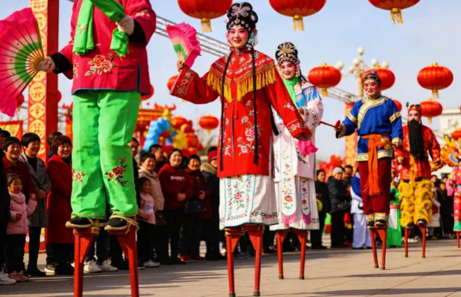 walking-on-stilts | China Xian Tour: Private & Tailor-Made China Tours Stilt walking during Lantern Festival