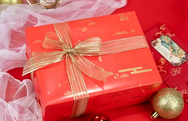 red-paper-wrap | China Xian Tour: Private & Tailor-Made China Tours Red festive gift box with gold ribbon