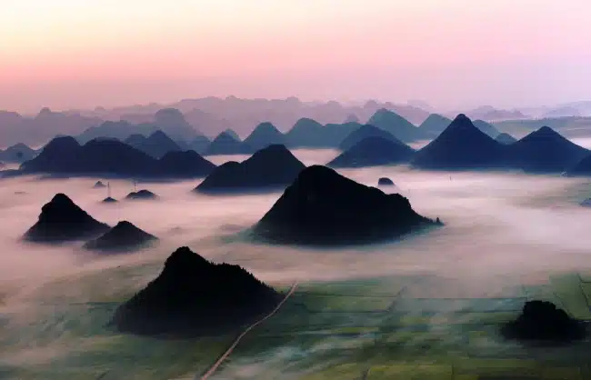 Luoping Sunrise over the Ten Thousand Mountains