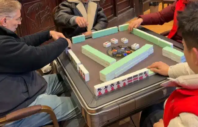 tourists experience playing mahjong - China Xian Tour: Private & Tailor-Made China Tours Tourists experience playing mahjong