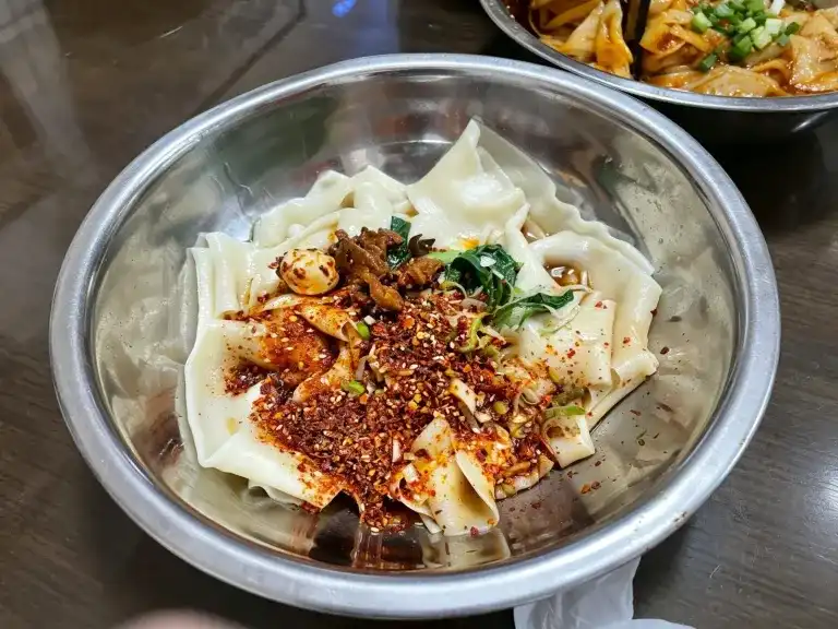 Ai Hua Ku Dai Mian | China Xian Tour: Private & Tailor-Made China Tours Ai Hua Belt-thick Noodles