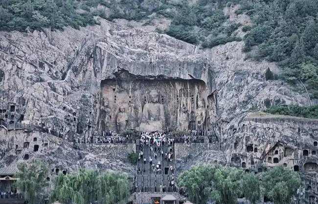 longmen-grottoes-from-yi-river-east-bank | China Xian Tour: Private & Tailor-Made China Tours Enjoy the view of Longmen Grottoes from Yi River East Bank