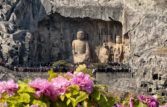 longmen-grottoes-in-luoyang-peony-season | China Xian Tour: Private & Tailor-Made China Tours Explore Longmen Grottoes in Luoyang’s peony season