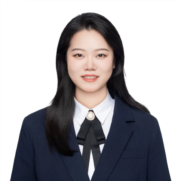 maxie-yang | China Xian Tour: Private & Tailor-Made China Tours | China Xian Tour: Private & Tailor-Made China Tours Professional headshot of a smiling Asian woman in a navy blazer and white shirt with a black necktie against a white background.