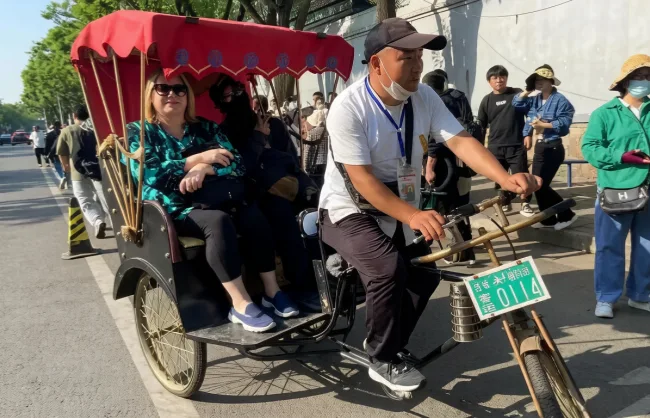 Take a rickshaw to tour Beijing's hutongs