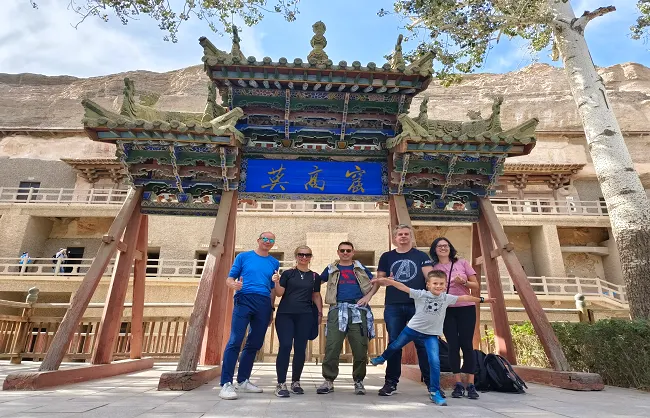 guests taking photos at mogao grottoes | China Xian Tour: Private & Tailor-Made China Tours guests taking photos at mogao grottoes