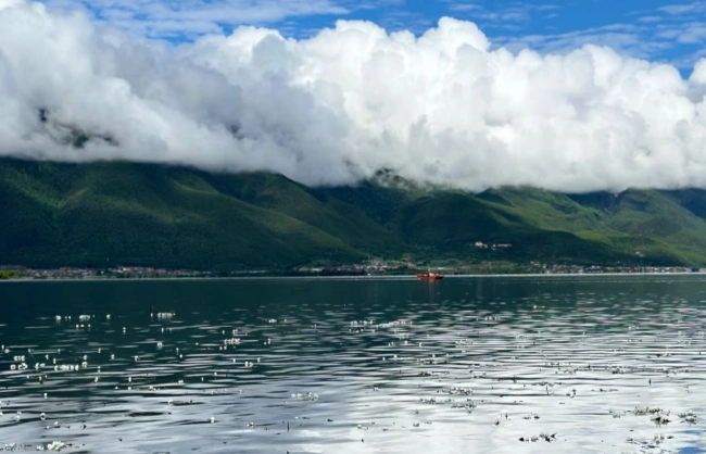 lugu lake glimmering under the blue sky | China Xian Tour: Private & Tailor-Made China Tours lugu lake glimmering under the blue sky
