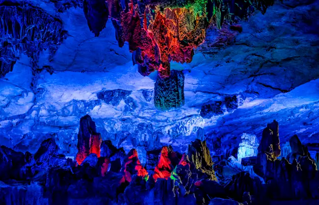 reed-flute-cave-guilin | China Xian Tour: Private & Tailor-Made China Tours Guilin Reed Flute Cave illuminated karst cavern with stalactites