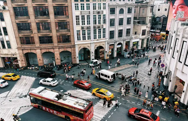 beijing-road-traditional-buildings-housing-modern-shops | China Xian Tour: Private & Tailor-Made China Tours beijing-road-traditional-buildings-housing-modern-shops